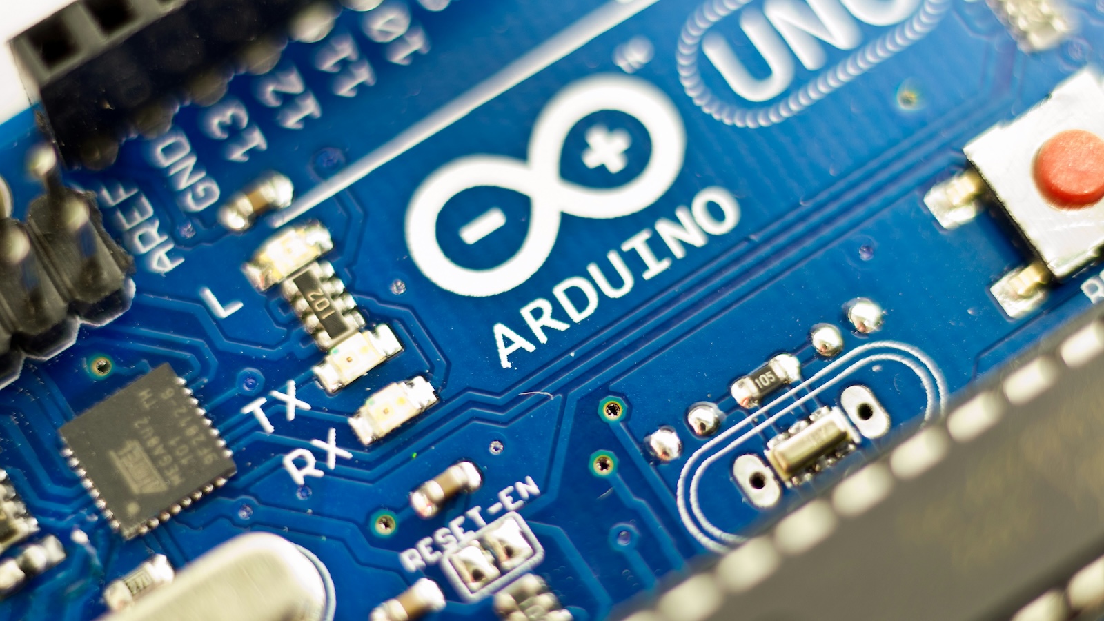 Arduino microcontroller programming lesson with an LED blink circuit.